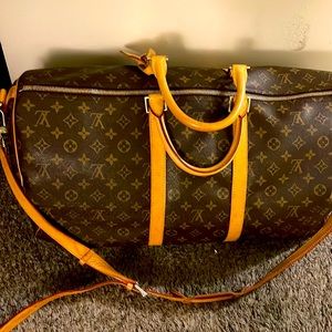 Louis Vuitton duffle bag/luggage carry